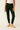 Person wearing H&M dark green pants and beige shoes 