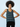 A woman wearing a patterned top with sleeveless design.