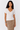Patterned V-Neck Top in White - Size: M